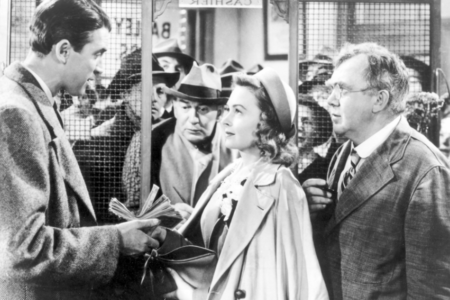 Une femme au milieu d'homme dans les bureaux