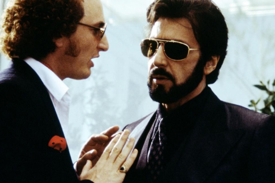 Al Pacino et un homme en train de discuter