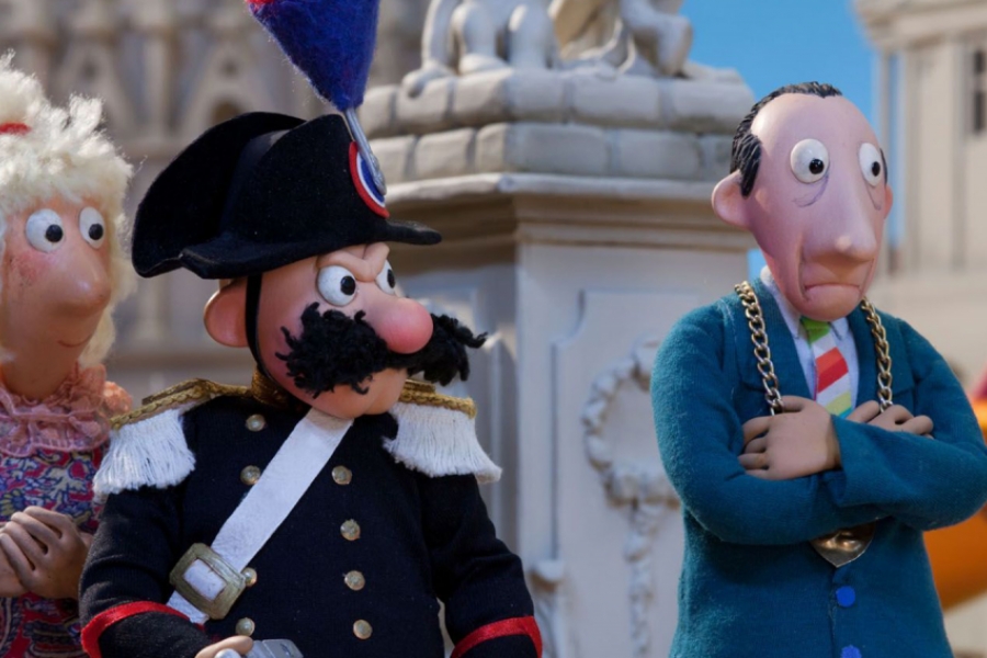 Des personnages devant un monument, l'un est en colère